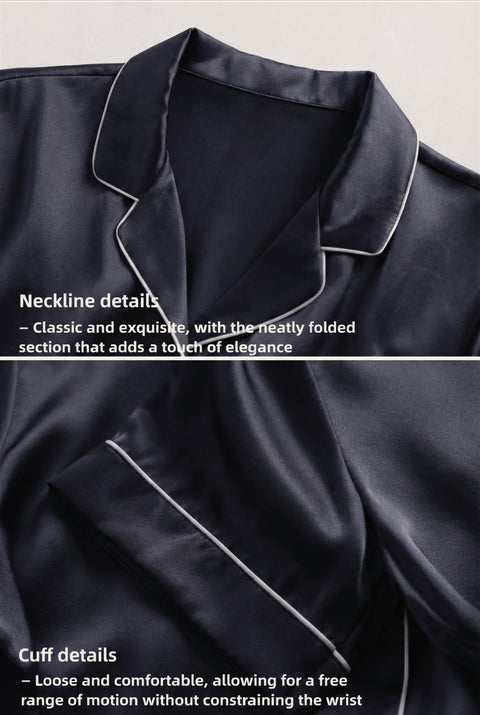 Close-up of a black satin garment with folded neckline and cuff details on a light gray background.